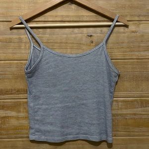 a blue and white striped tank